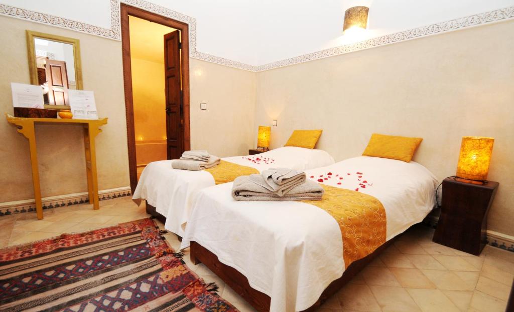 Postel nebo postele na pokoji v ubytování Riad Elias & Spa