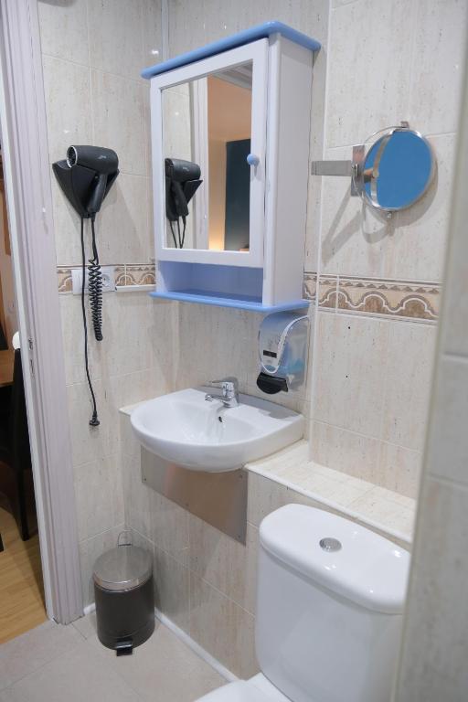 Koupelna v ubytování Hotel Arbre De Neu