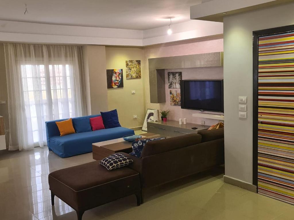 TV a/nebo společenská místnost v ubytování Cavalli Boutique apartments - October