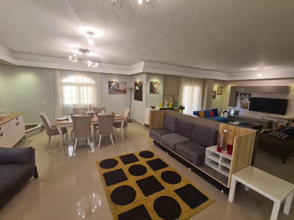 TV a/nebo společenská místnost v ubytování Cavalli Boutique apartments - October