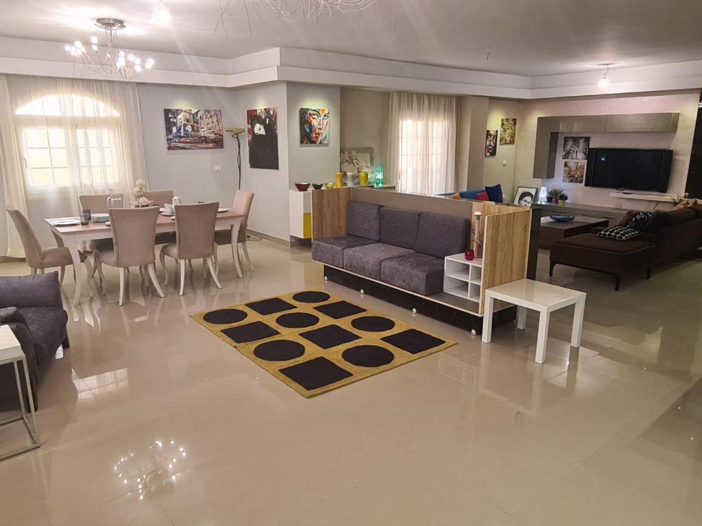 TV a/nebo společenská místnost v ubytování Cavalli Boutique apartments - October