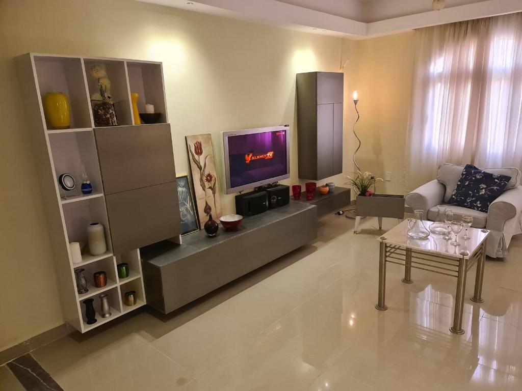 TV a/nebo společenská místnost v ubytování Cavalli Boutique apartments - October