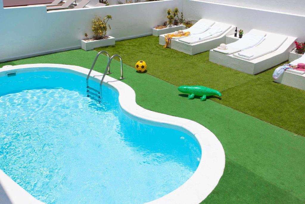 Bazén v ubytování Casa Royal Park by Vacanzy Collection nebo v jeho okolí