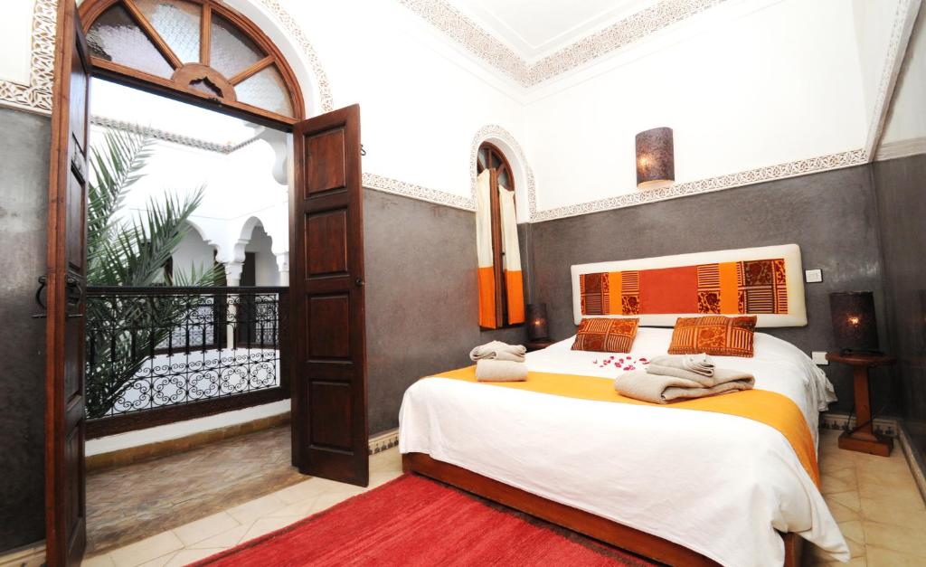 Postel nebo postele na pokoji v ubytování Riad Elias & Spa