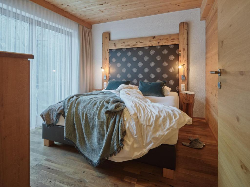 Postel nebo postele na pokoji v ubytování Boutique Apartment Sonnenhang - incl Rooftop Spa