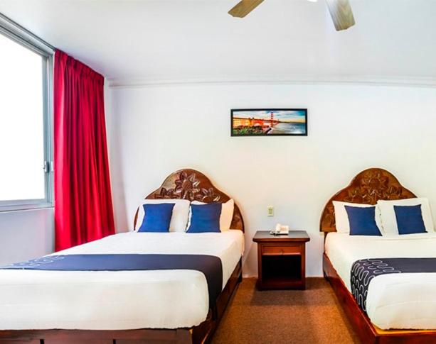 Postel nebo postele na pokoji v ubytování Hotel HC