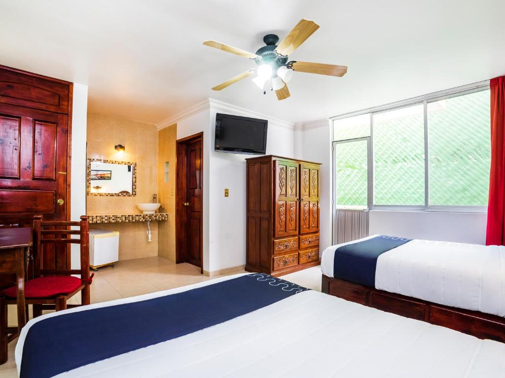 Postel nebo postele na pokoji v ubytování Hotel HC