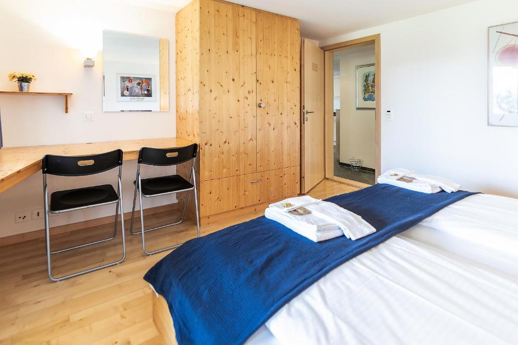Postel nebo postele na pokoji v ubytování Chalet Steingärtli 1