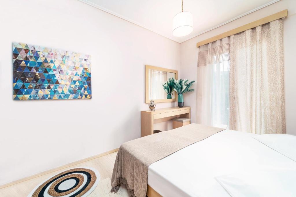 Postel nebo postele na pokoji v ubytování Adani Hotel