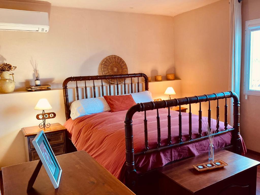 Postel nebo postele na pokoji v ubytování La casa del Riu Vell