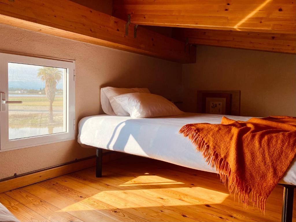 Postel nebo postele na pokoji v ubytování La casa del Riu Vell