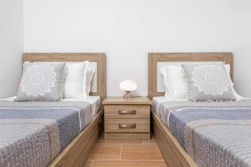 Posteľ alebo postele v izbe v ubytovaní Dennis City Center Elegant Apartment (2)