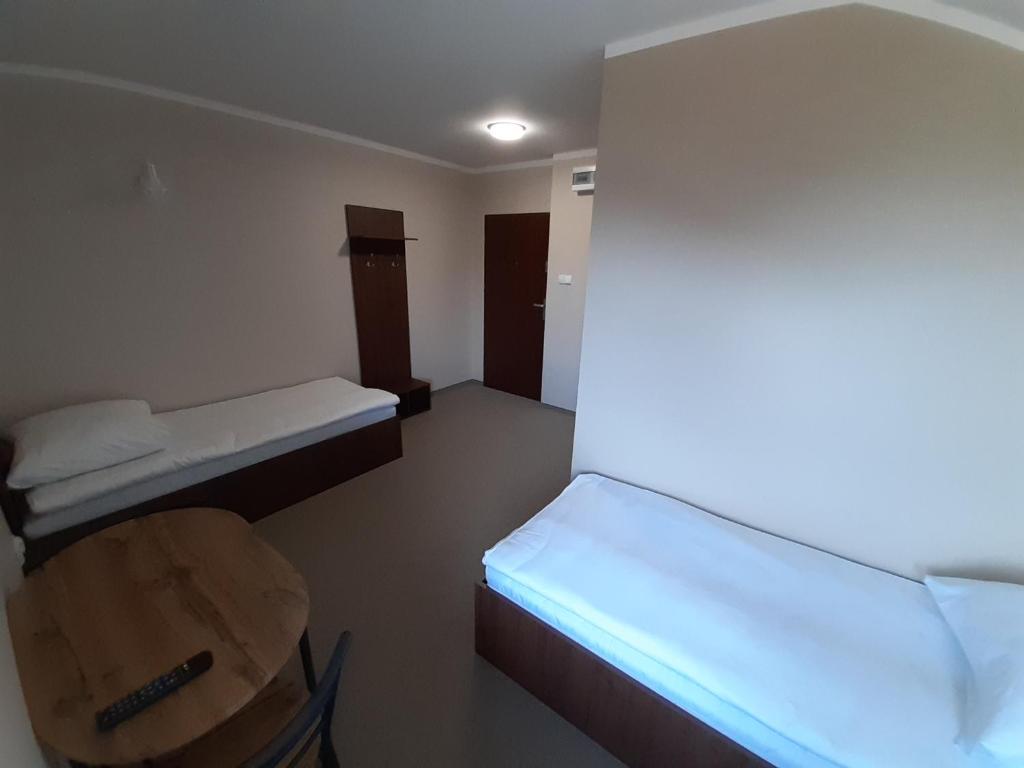 Postel nebo postele na pokoji v ubytování Willa Czajki