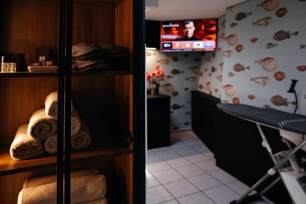 TV a/nebo společenská místnost v ubytování River Residence