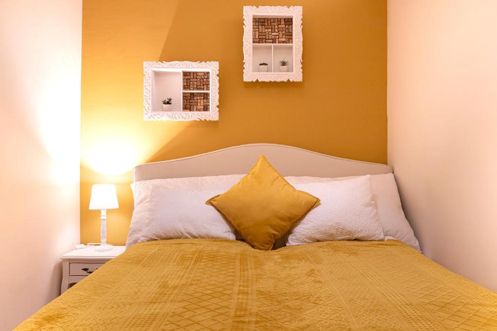 Posteľ alebo postele v izbe v ubytovaní Cork Apartman