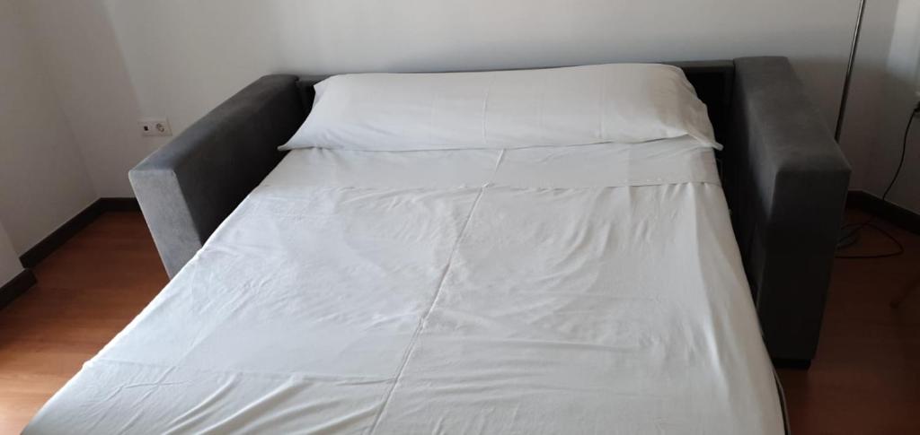Posteľ alebo postele v izbe v ubytovaní Apartamentos Balcón de la Vega