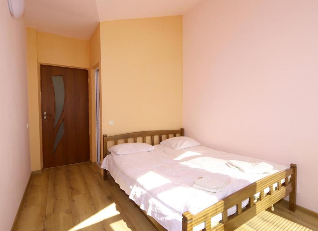 Postel nebo postele na pokoji v ubytování COMMUNE hotel