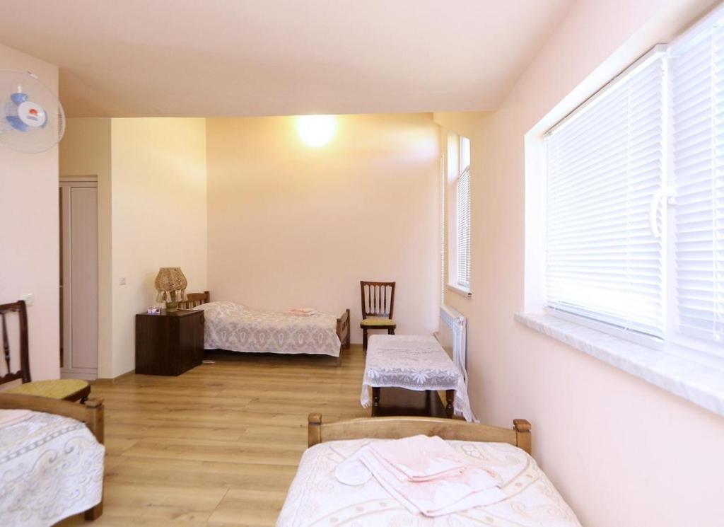 Postel nebo postele na pokoji v ubytování COMMUNE hotel