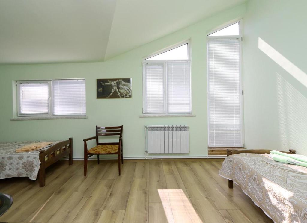Postel nebo postele na pokoji v ubytování COMMUNE hotel