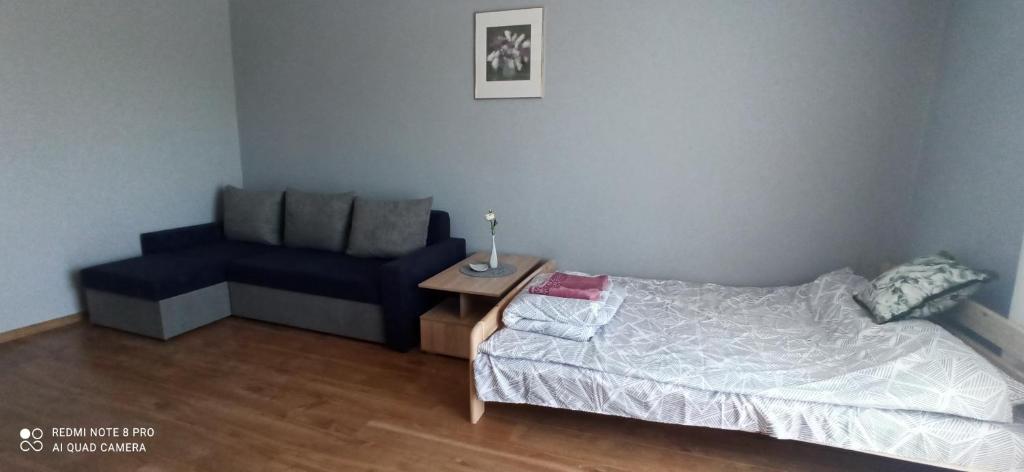 Posteľ alebo postele v izbe v ubytovaní Apartament 3-go Maja