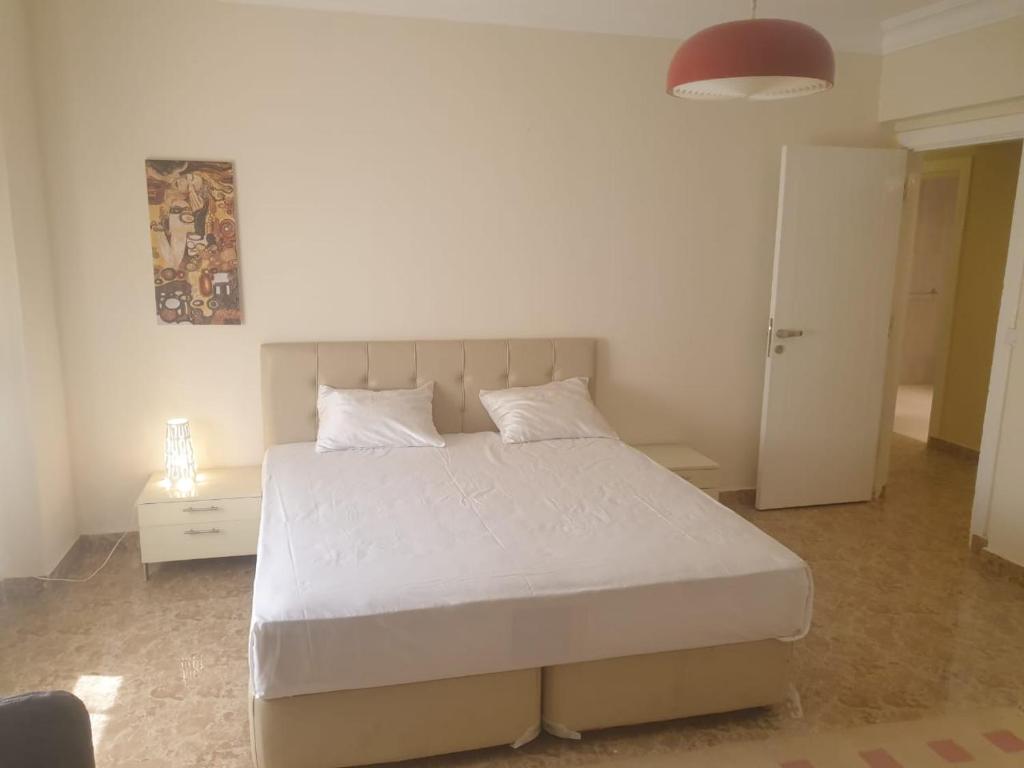 Postel nebo postele na pokoji v ubytování Cavalli Boutique apartments - October