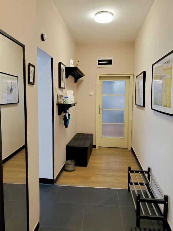 Postel nebo postele na pokoji v ubytování Sunny Central Apartment