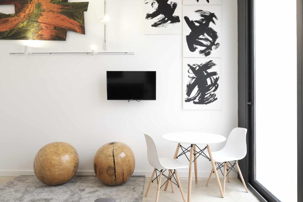 TV a/nebo společenská místnost v ubytování Alandalus Modern