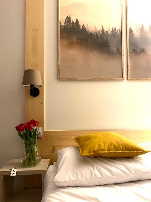 Postel nebo postele na pokoji v ubytování Karolowy pokoje&apartamenty