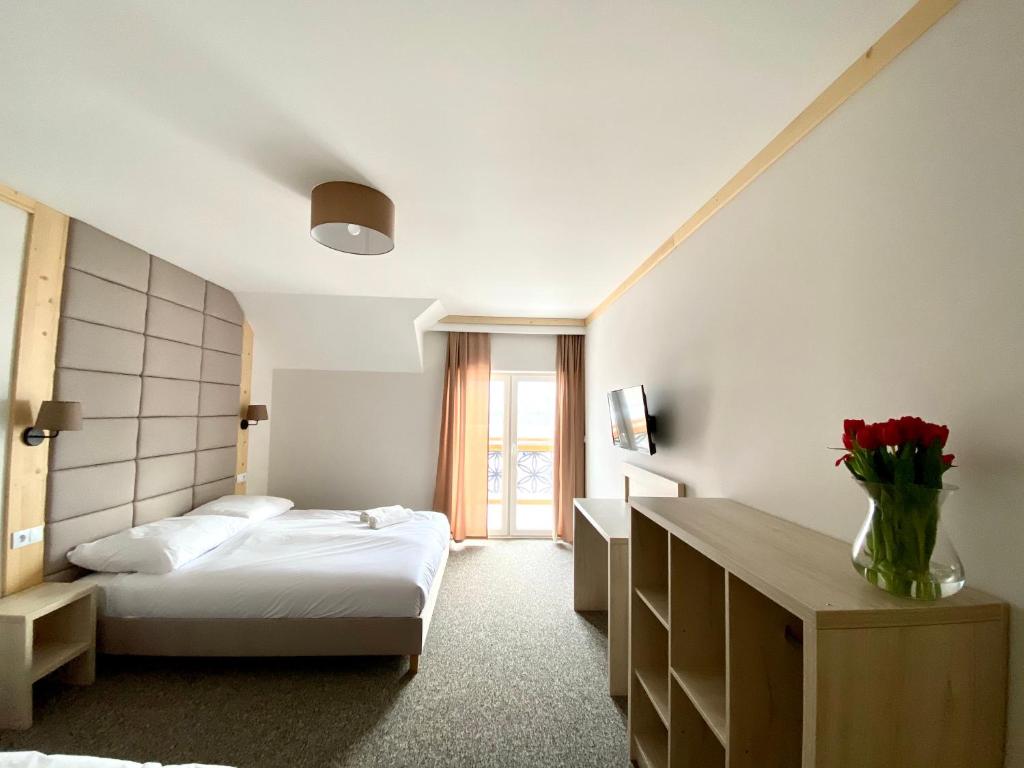 Postel nebo postele na pokoji v ubytování Karolowy pokoje&apartamenty