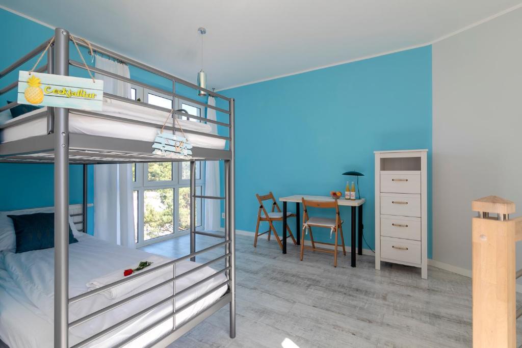 Posteľ alebo postele v izbe v ubytovaní TriApart Amber Jantar V
