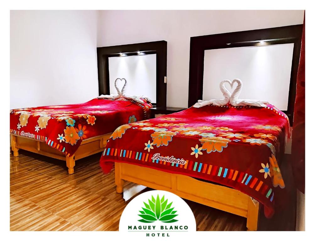 Postel nebo postele na pokoji v ubytování Hotel Maguey blanco