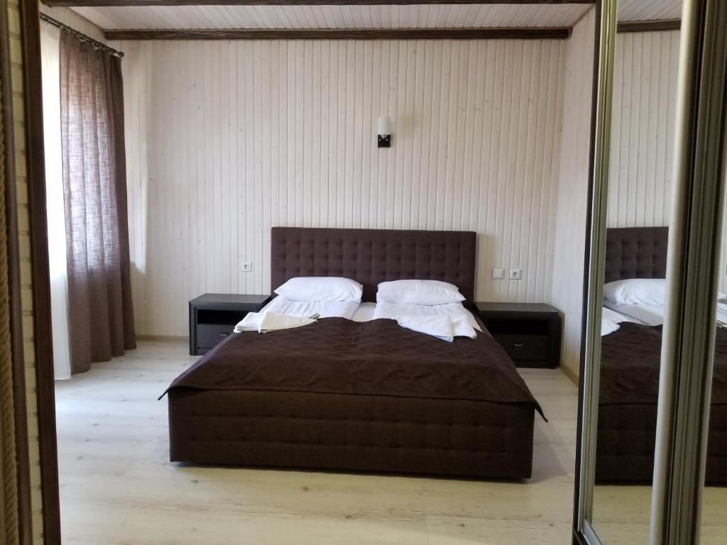 Postel nebo postele na pokoji v ubytování Guest House Mountain