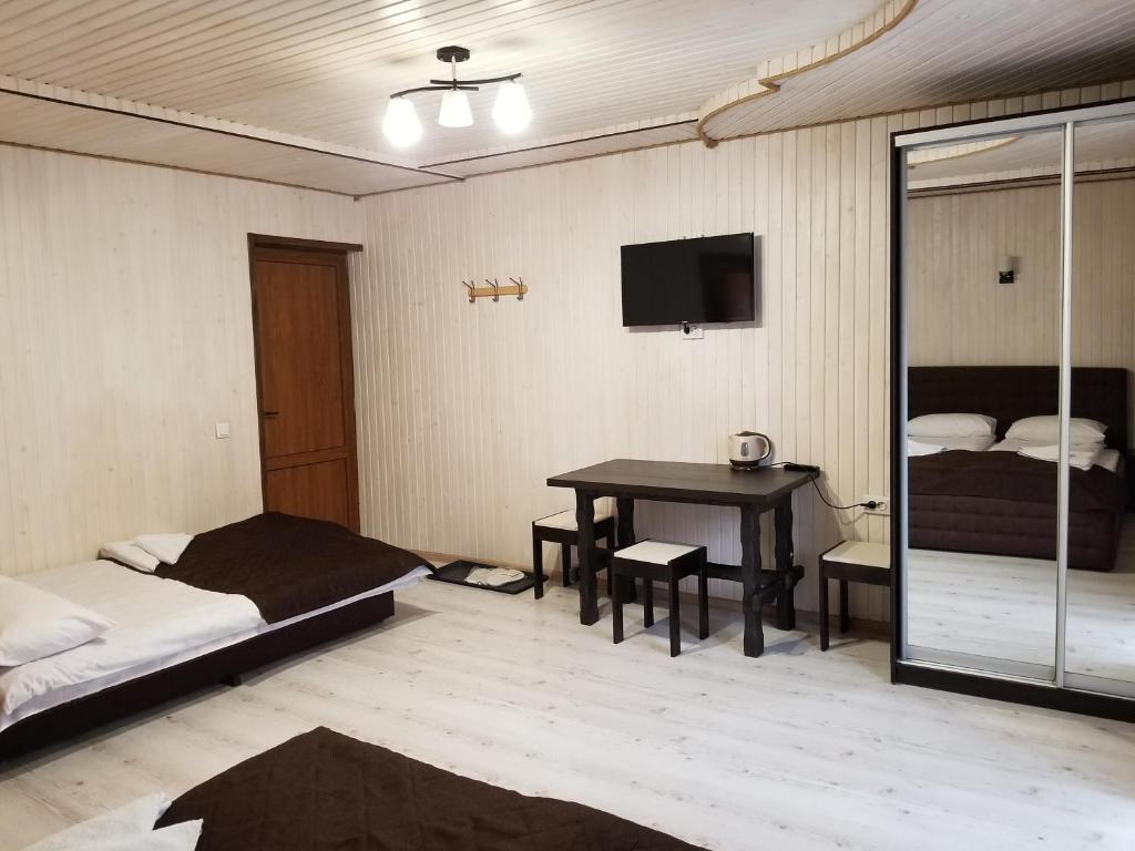 Postel nebo postele na pokoji v ubytování Guest House Mountain