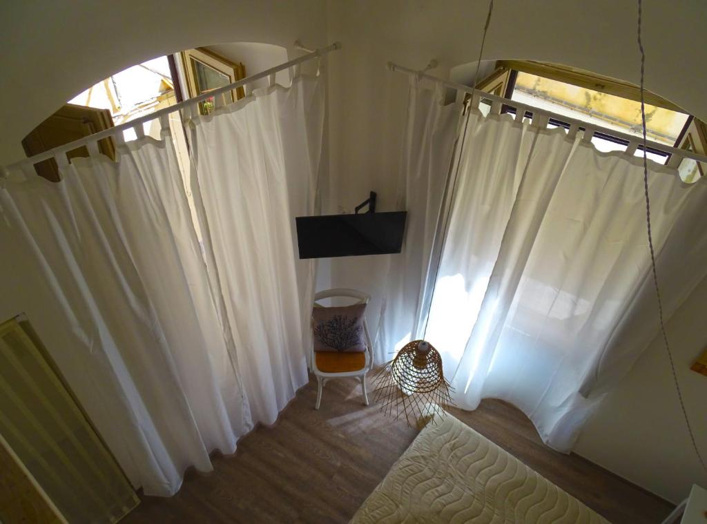 Letto o letti in una camera di B&B Mescia Marina