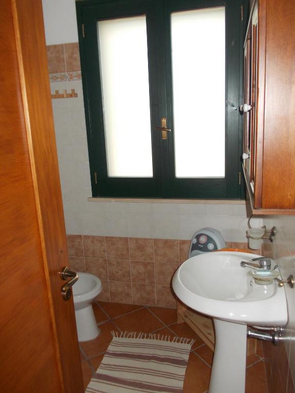 Koupelna v ubytování Agriturismo Arangèa