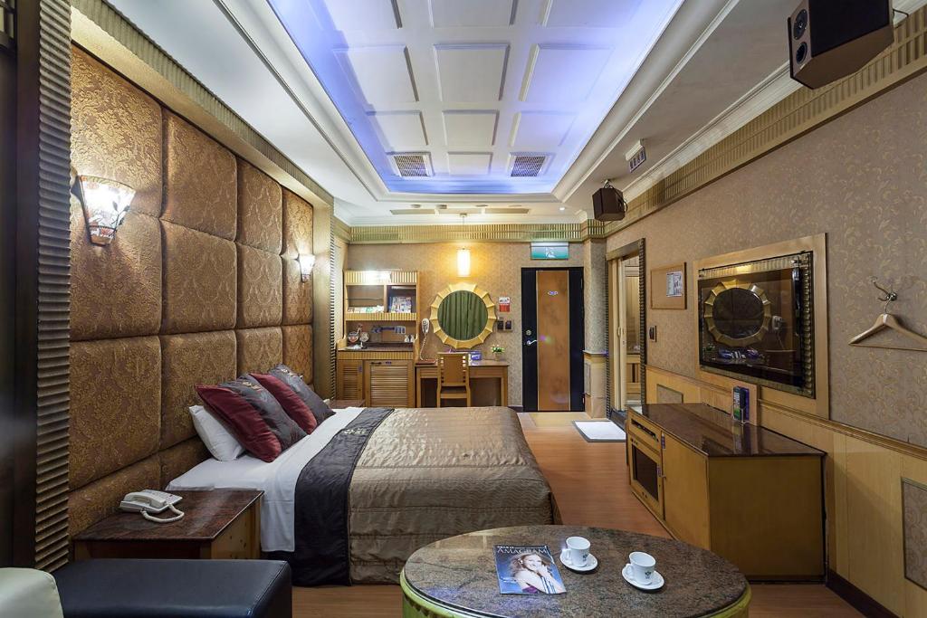 Postel nebo postele na pokoji v ubytování PGS Motel