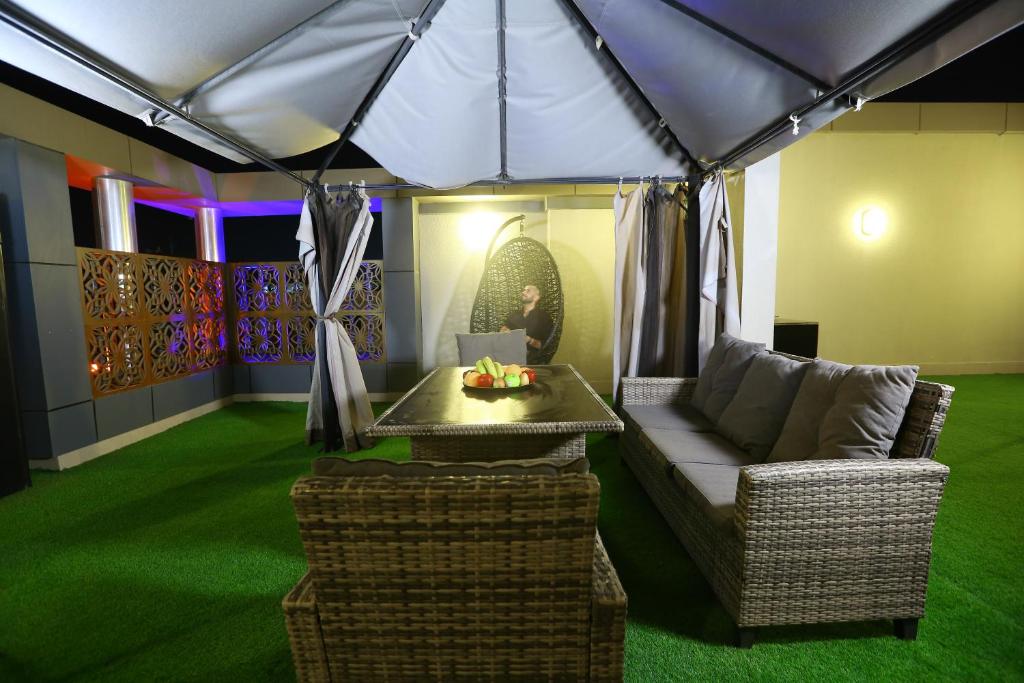Posezení v ubytování Lotaz Hotel Apartments - Al Salamah