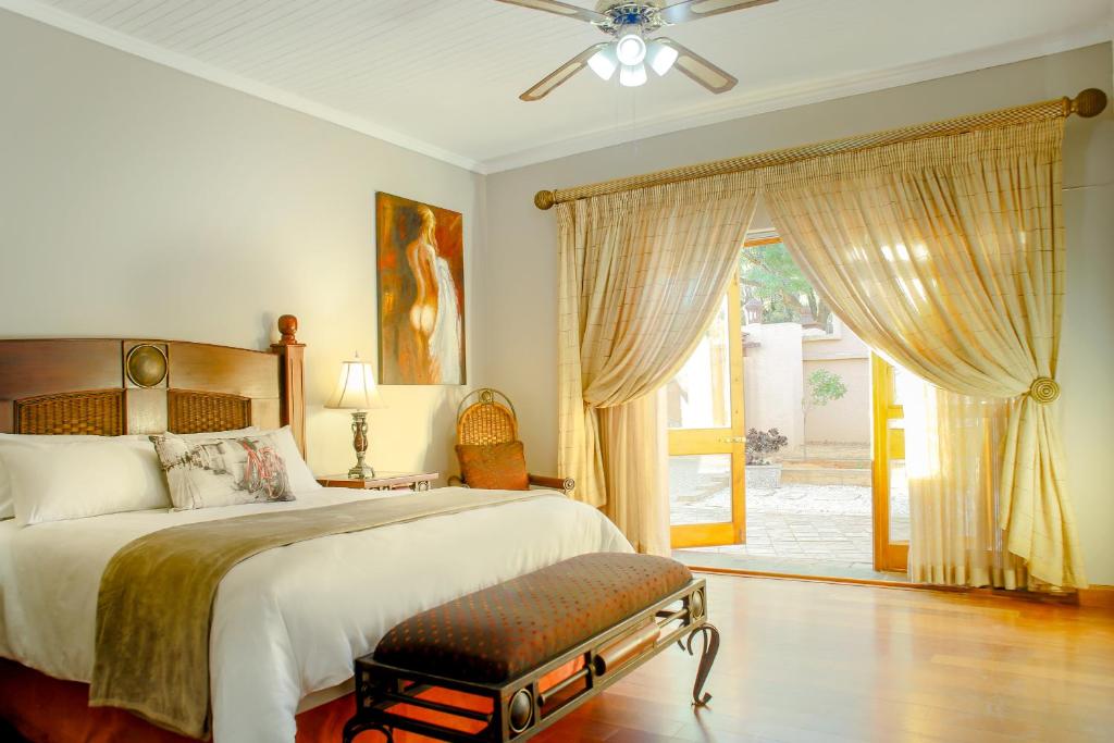 Postel nebo postele na pokoji v ubytování Deale Road Guesthouse