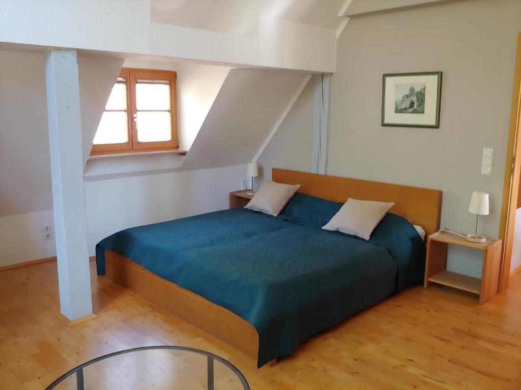 Postel nebo postele na pokoji v ubytování Pension Fuchsmühle