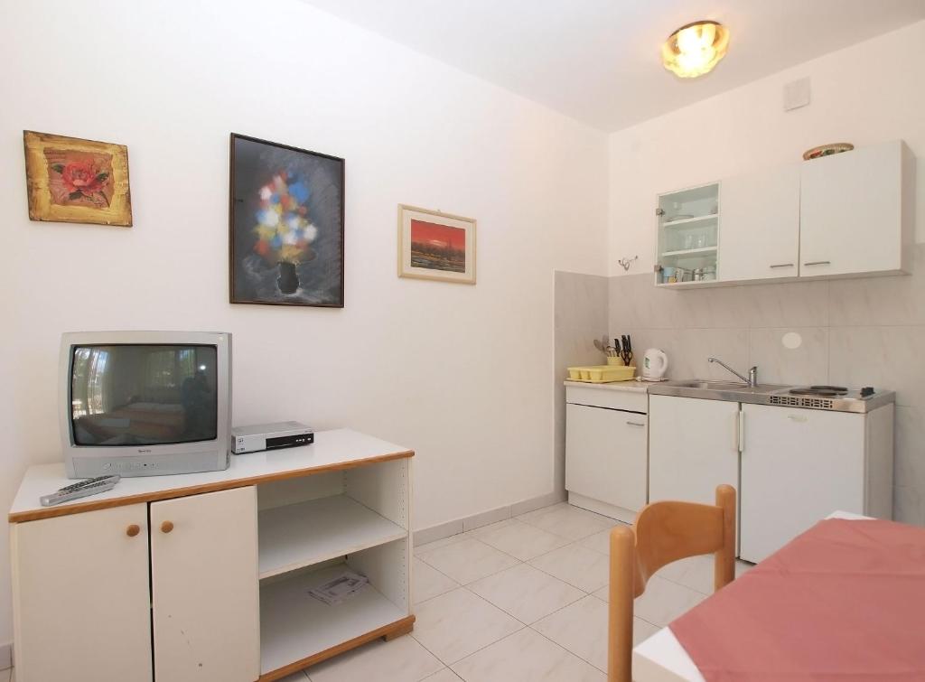 Kuchyň nebo kuchyňský kout v ubytování Apartments Puntizela 727