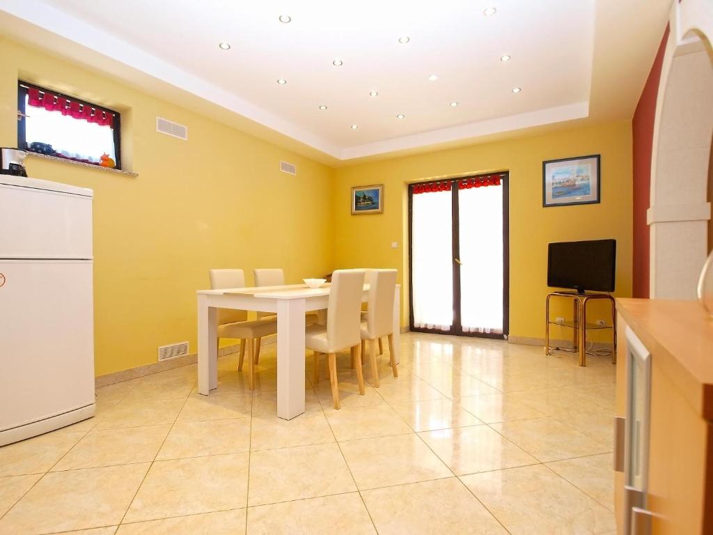 TV a/nebo společenská místnost v ubytování Apartments Puntizela 727