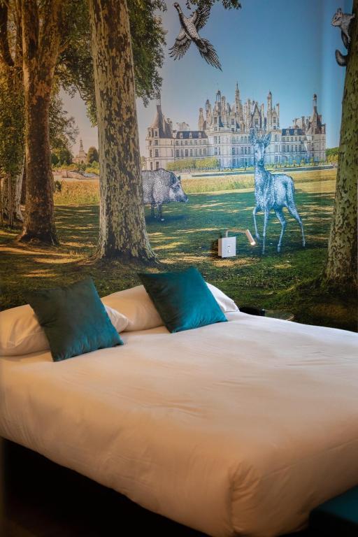 Postel nebo postele na pokoji v ubytování ibis Styles Contres-Cheverny