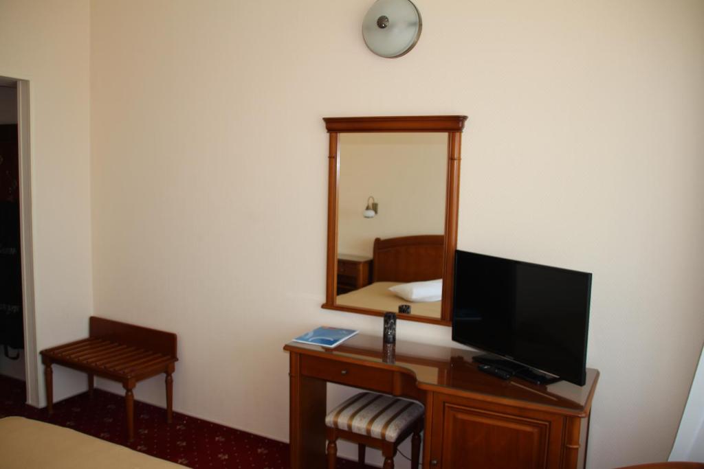 TV a/nebo společenská místnost v ubytování Hotel Traian