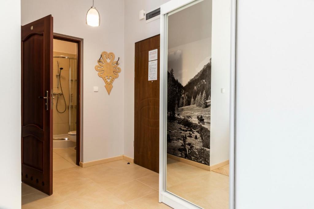 Kúpeľňa v ubytovaní udanypobyt Apartament z Basenem