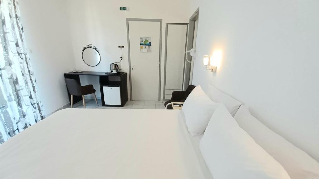 Postel nebo postele na pokoji v ubytování Koukounari 2 Rooms