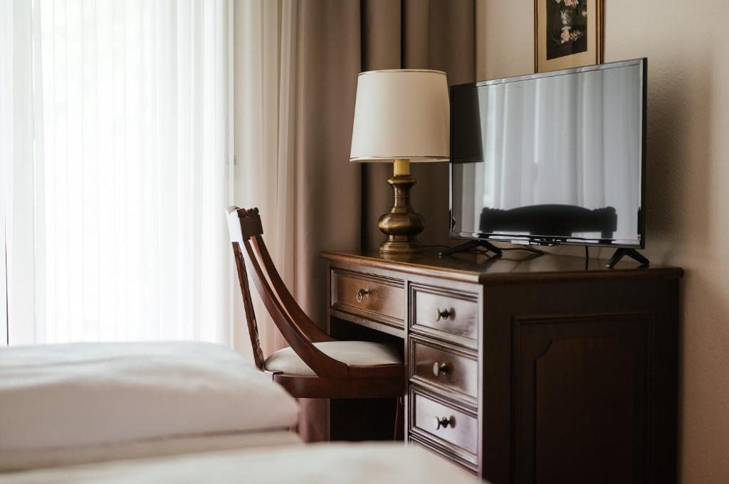 Postel nebo postele na pokoji v ubytování Hotel Isabella