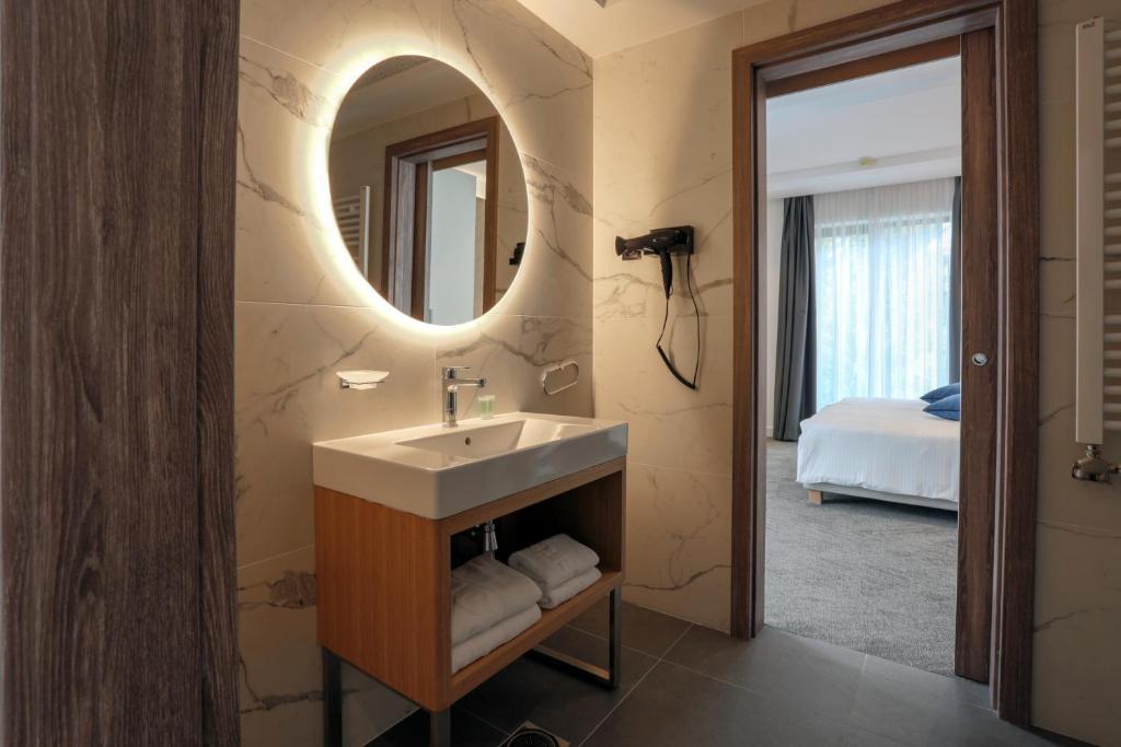 Postel nebo postele na pokoji v ubytování Hotel MIR