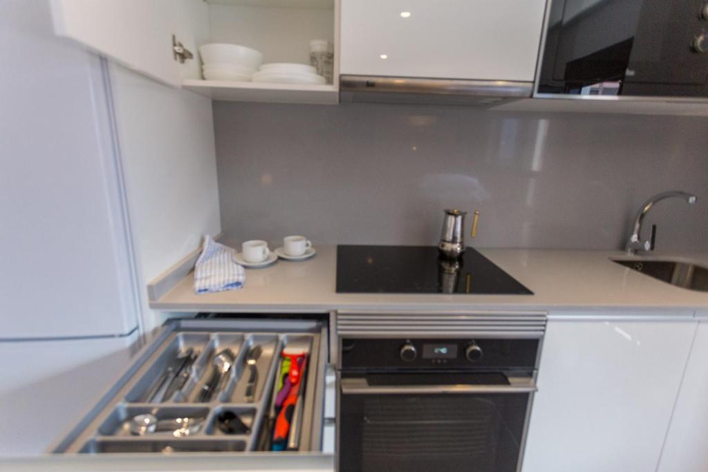 Kuchyň nebo kuchyňský kout v ubytování Apartamento Las Canteras Beachway