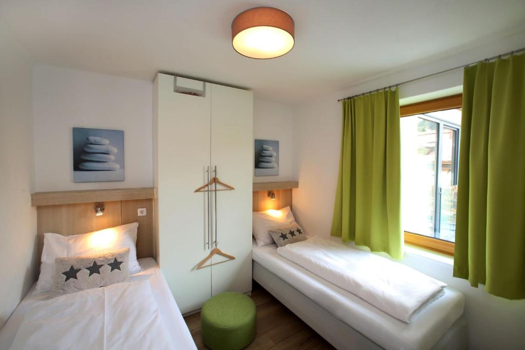 Postel nebo postele na pokoji v ubytování Annika Apartments summer card included