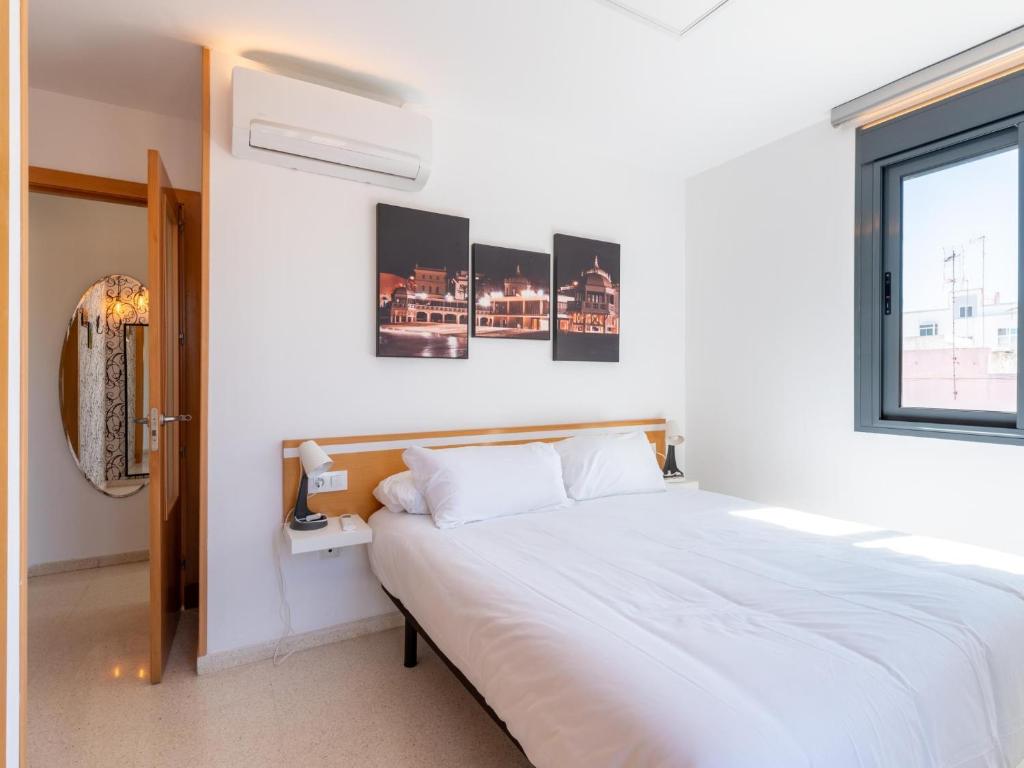 Posteľ alebo postele v izbe v ubytovaní Apartamento LABORT Apartamento Boutique